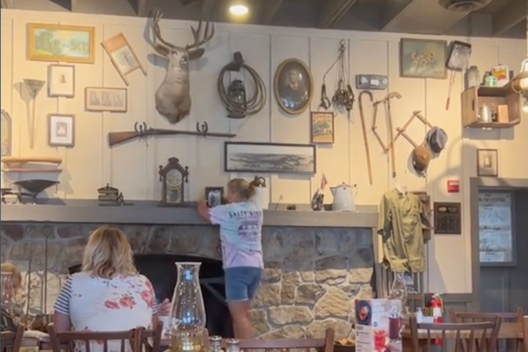 ‘the-best-thing-i’ve-ever-seen’:-a-woman-is-going-viral-for-pranking-cracker-barrel-by-adding-a-photo-of-herself-to-the-decor